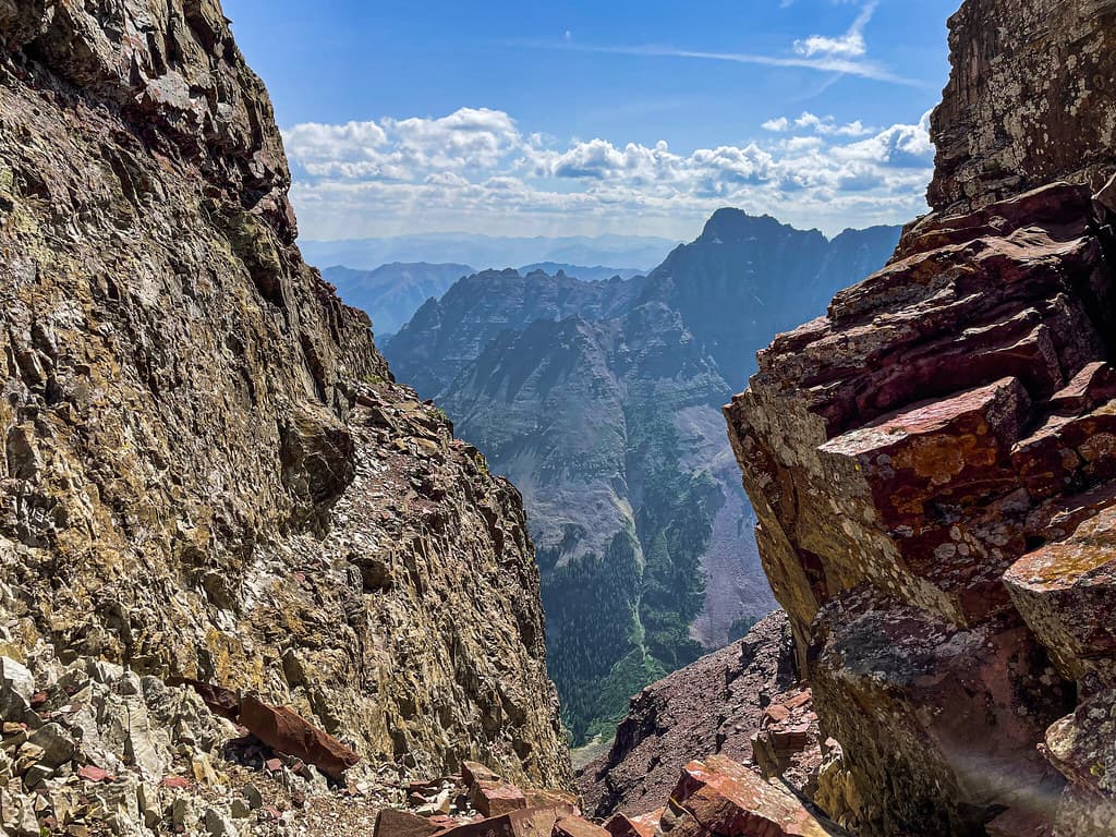 At the top of the Bell Cord Couloir, looking east to Pyramid Peak.