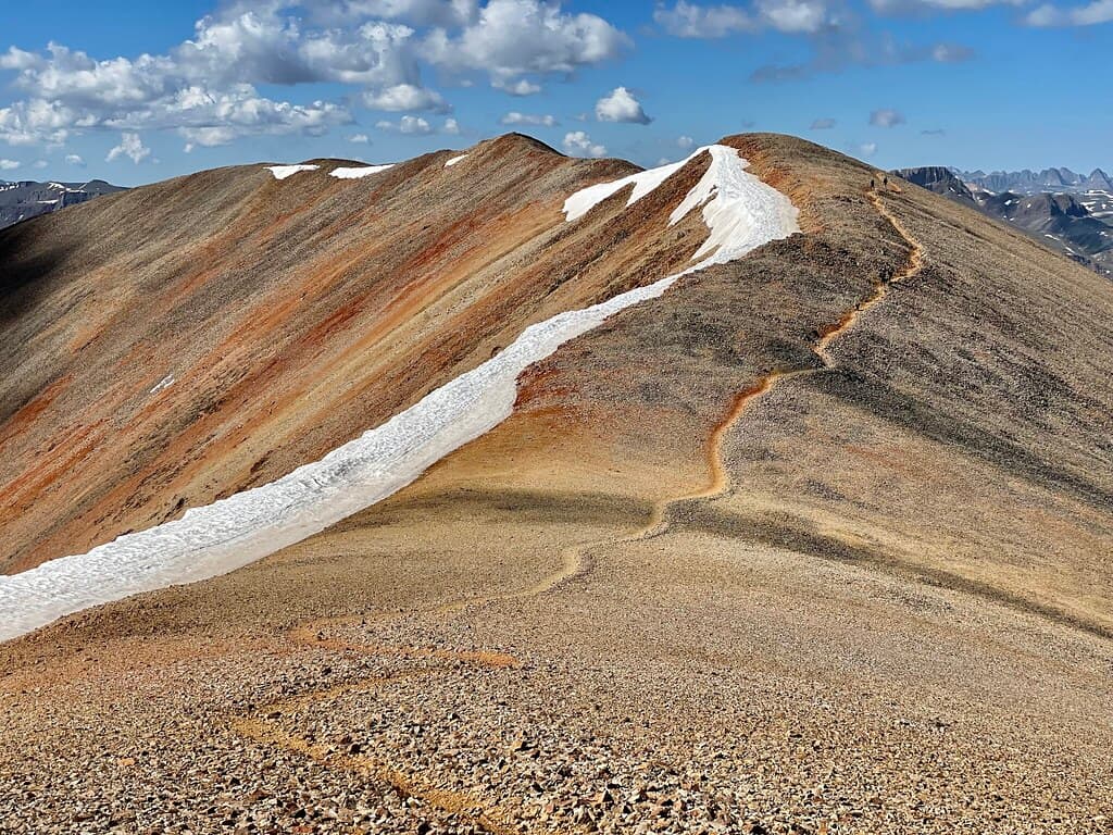 Dropping off of Redcloud Peak to ascend its neighbor, Sunshine Peak. July 2021.